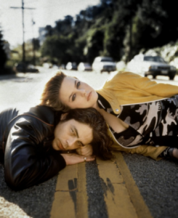 Alicia Silverstone and Benicio Del Toro exuding 90s angst.